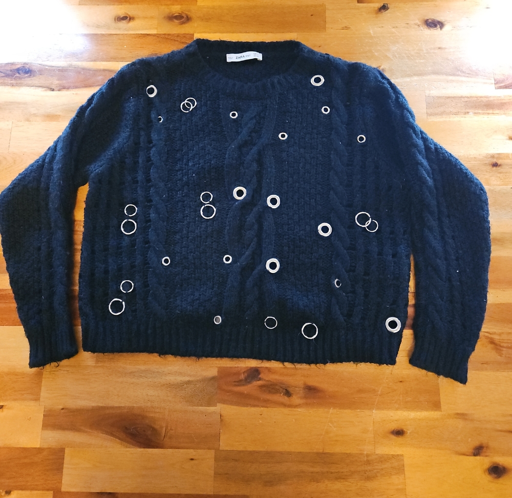 Black Cable Knit Sweater with Silver Eyelet Details